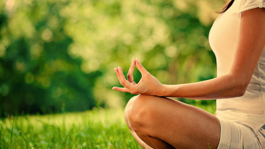 woman-doing-meditation-outdoors